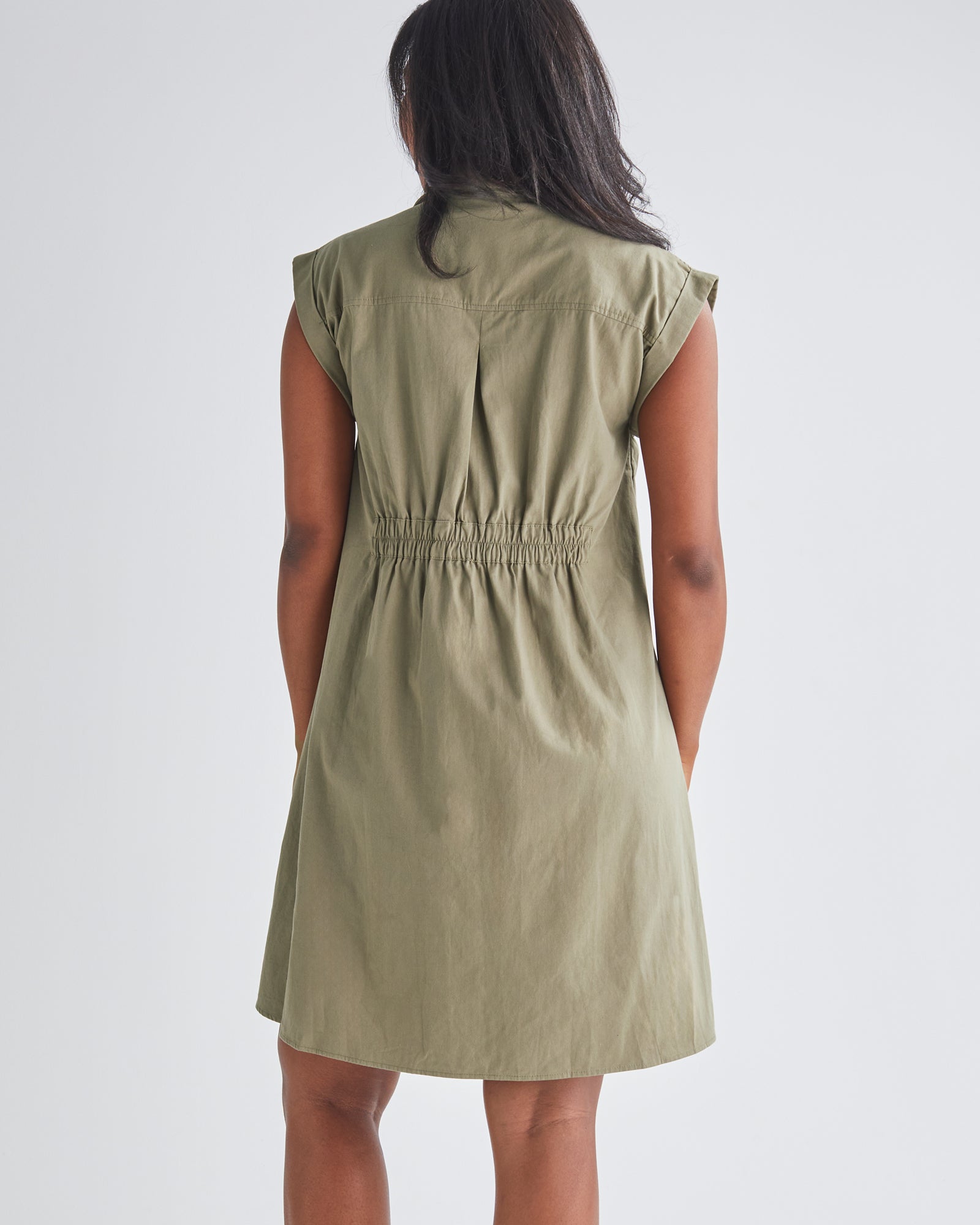 Back View - A Pregnannt Woman Wearing Kaya Maternity Safari Shirt Cotton Dress In Khaki from Angel Maternity.