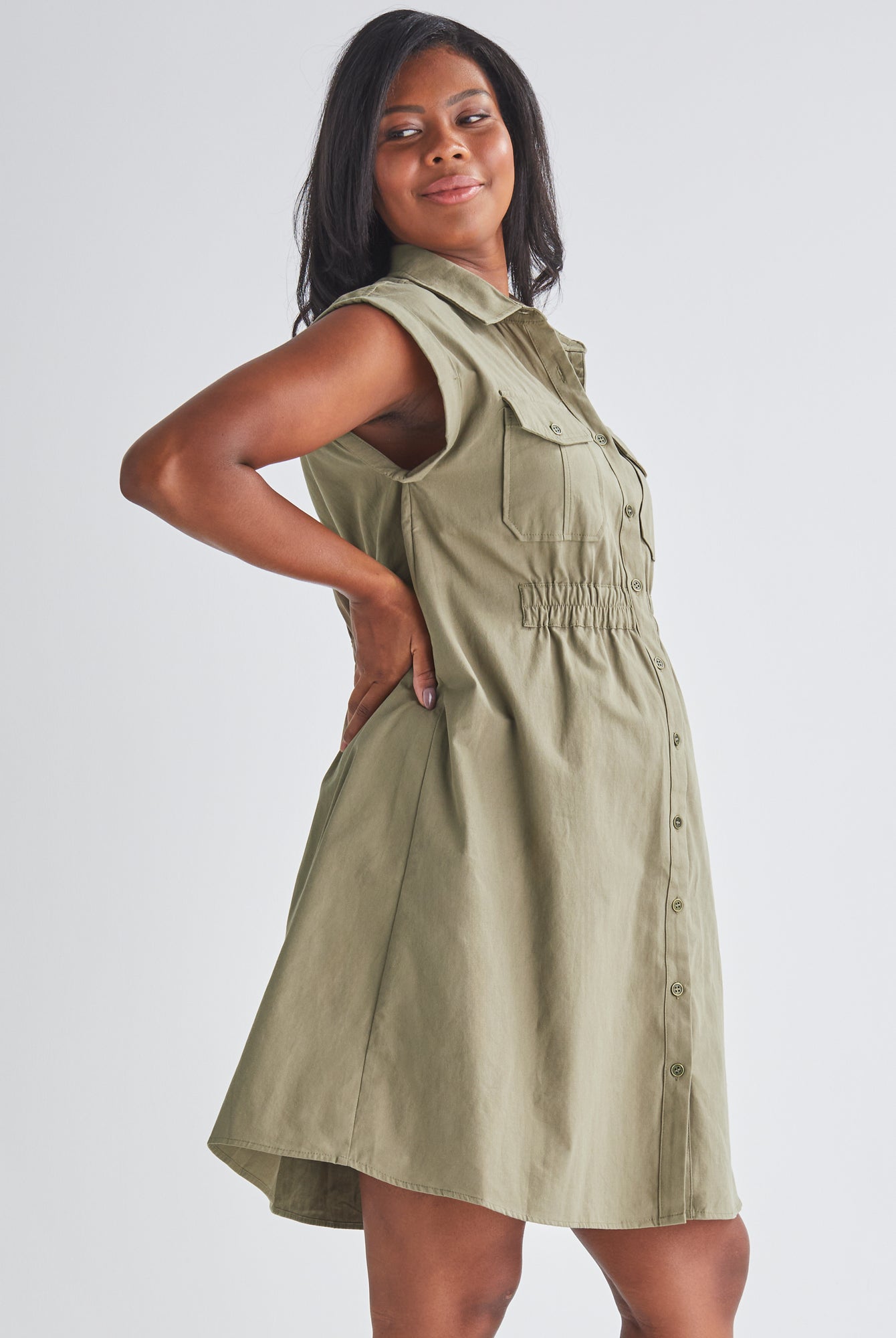 side View - A Pregnannt Woman Wearing Kaya Maternity Safari Shirt Cotton Dress In Khaki from Angel Maternity.