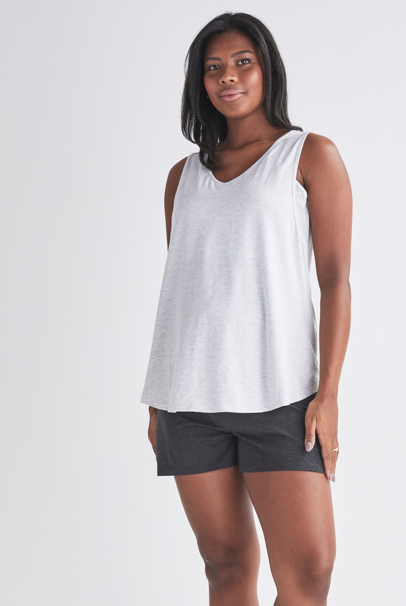 Main View - A Pregnannt Woman Wearing 2-piece Maternity/Nursing Pyjama Set - Top & Shorts from Angel Maternity.