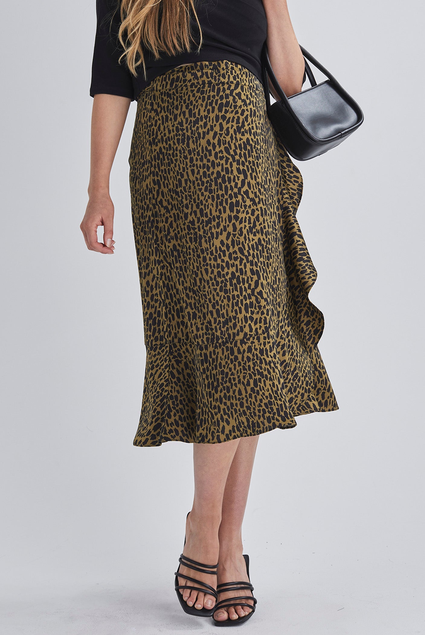 Front view-Throw on and go Midi skirt Designed to fit through all stages of pregnancy Wrap design Ruffled hem from AngelMaternity