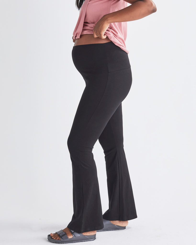 Side View - Deluxe Flare Black Maternity Legging in Bamboo from Angel Maternity.