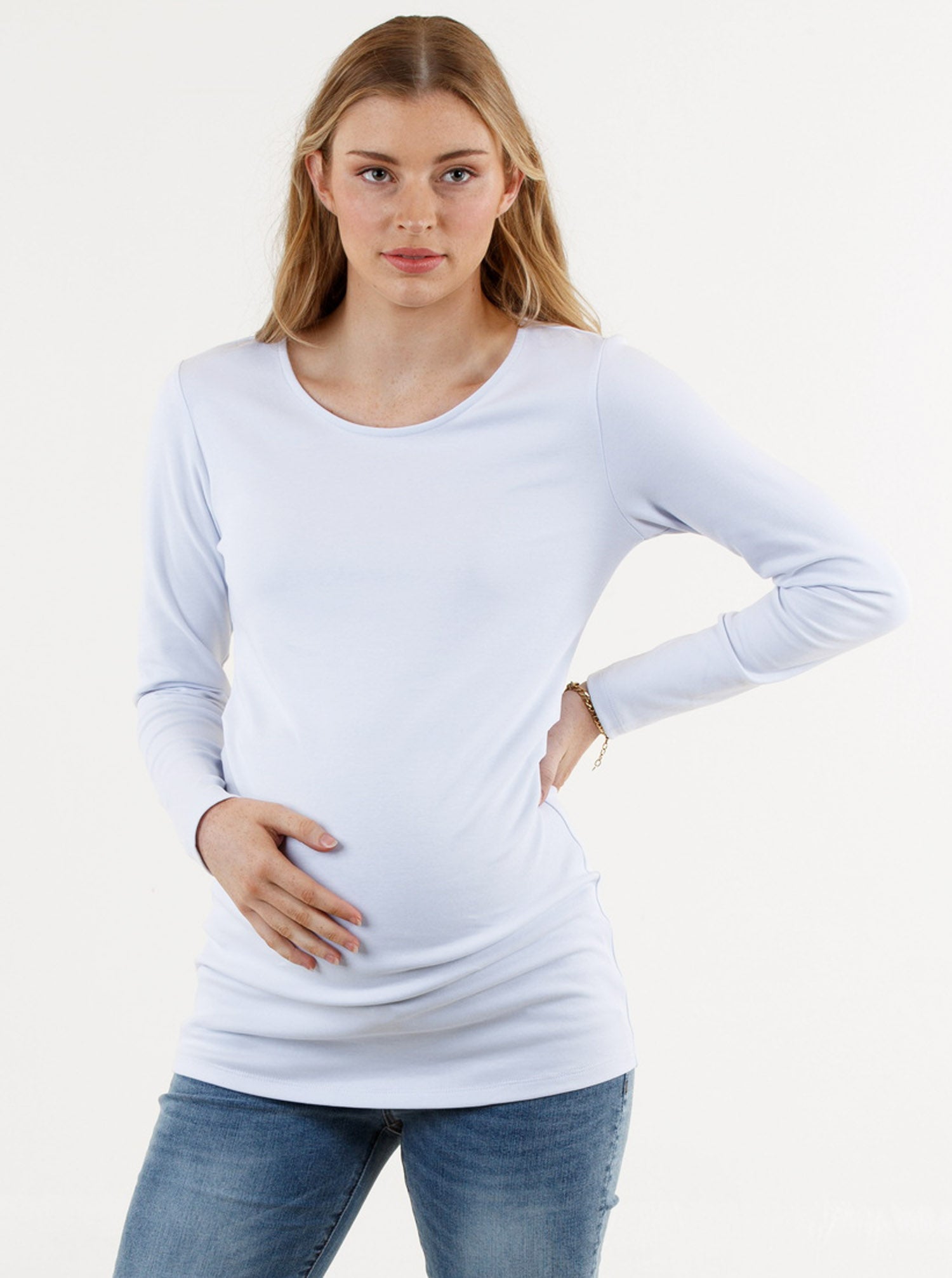 A young pregnant woman in Basic White Long Sleeve Cotton Maternity Top (6669517160542)