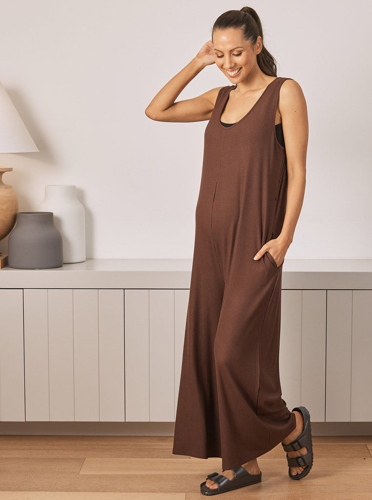 Main View - A Pregnant Woman in Maternity Ribbed Jumpsuit Pants in Chocolate Colour