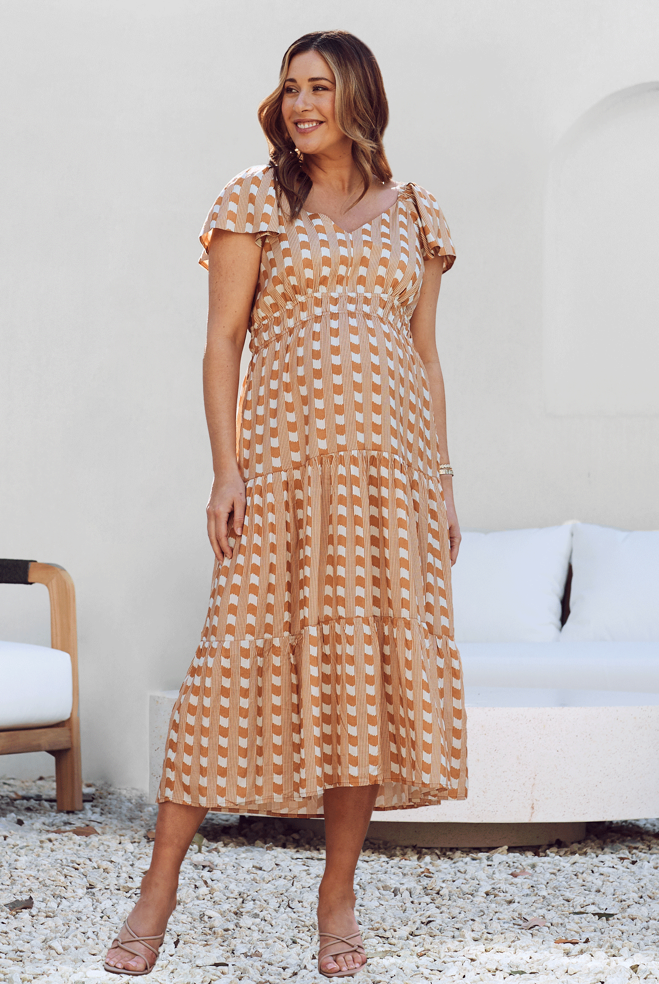 front view - Maternity ruffled baby shower dress gingham camel