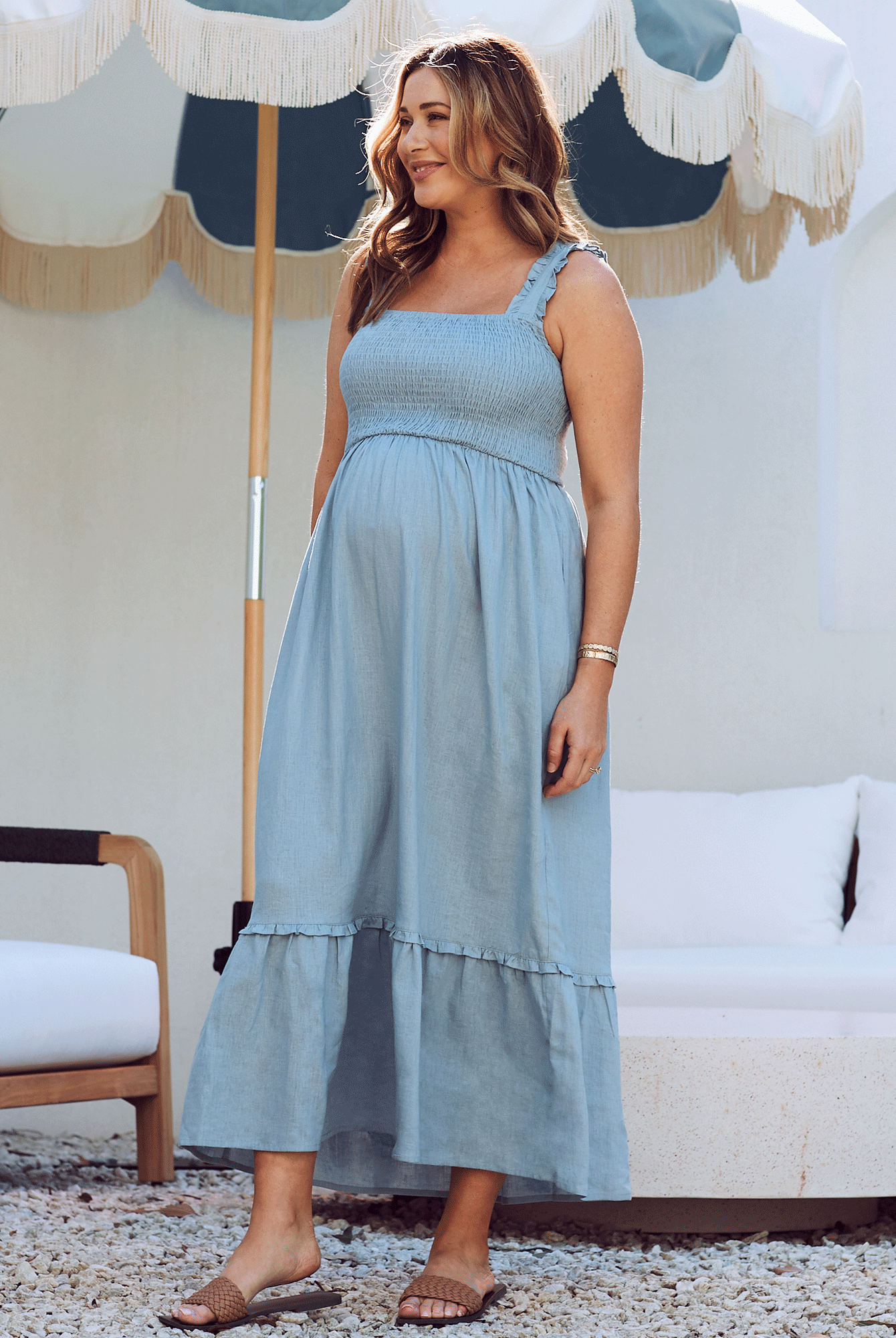 Side view - Maternity shirred dress in light blue