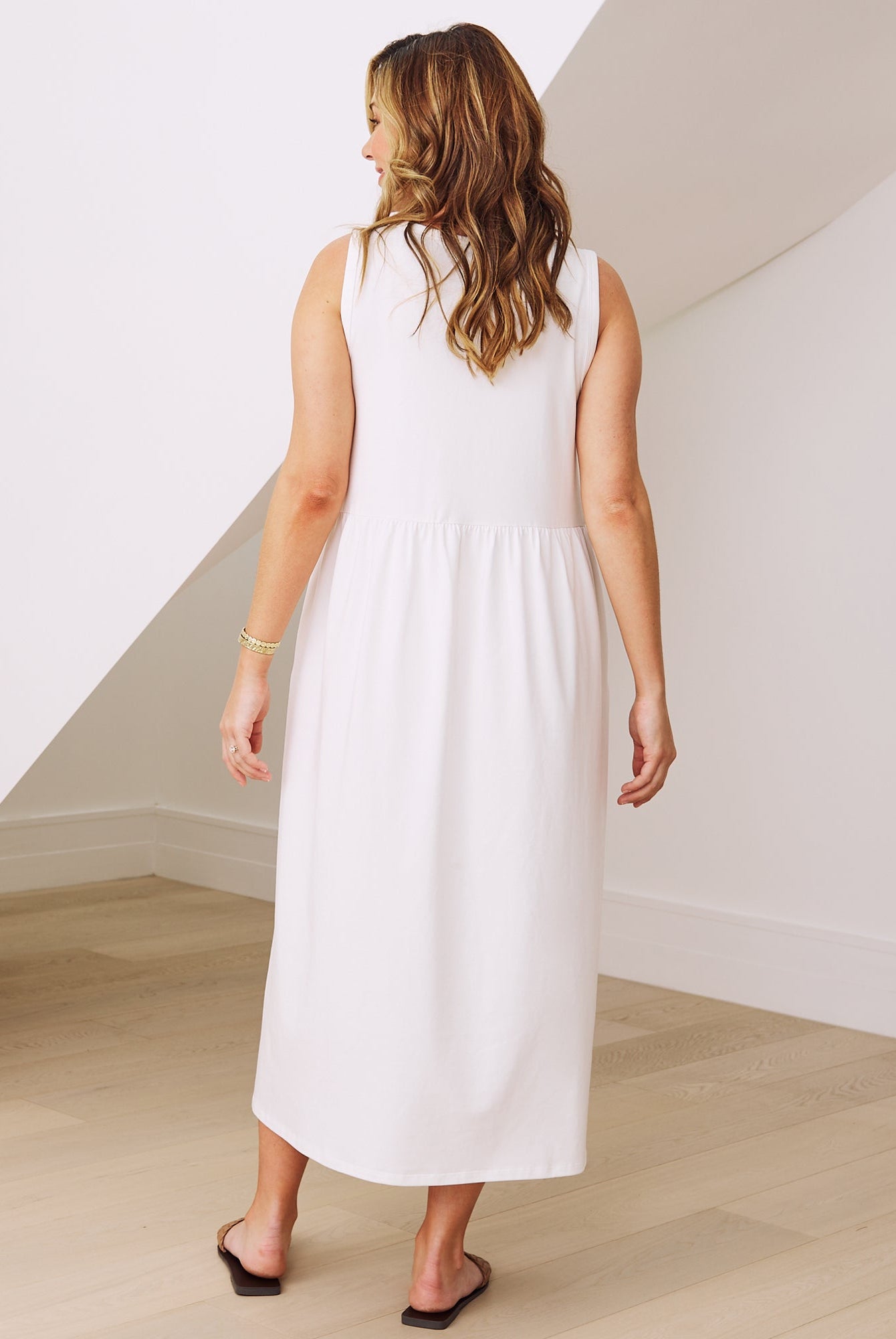 Back view- maternity relaxed fit cotton dress in white