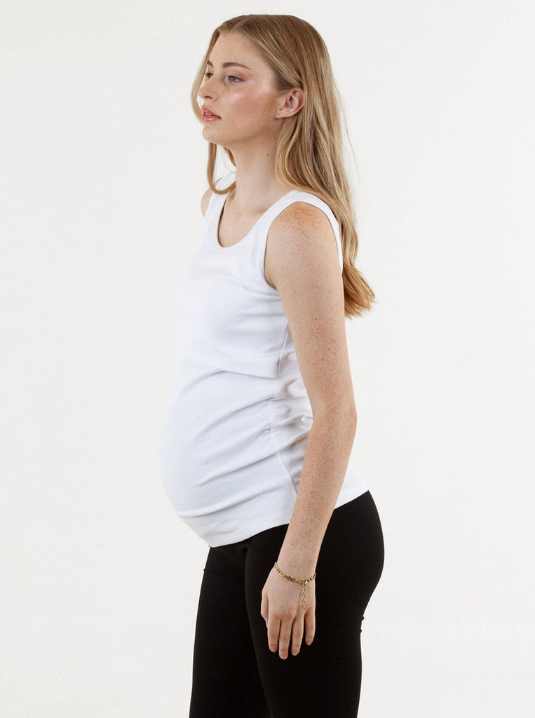 Side View - A Pregnannt Woman Wearing Maya Maternity & Nursing Cotton Tank in White from Angel Maternity.