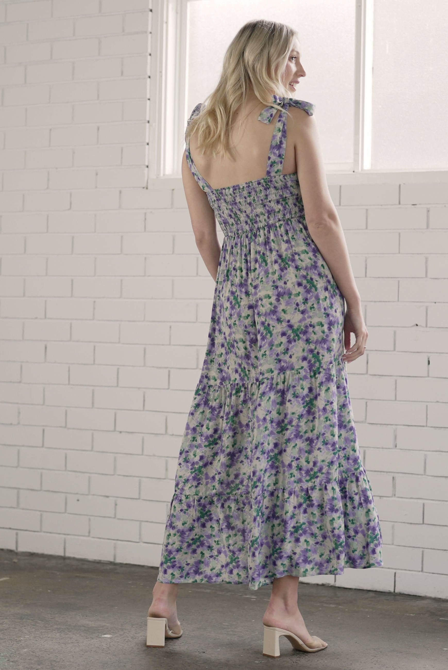 Back view - A Pregnant Woman in Purple Floral Maternity Maxi Dress (6726602621022)