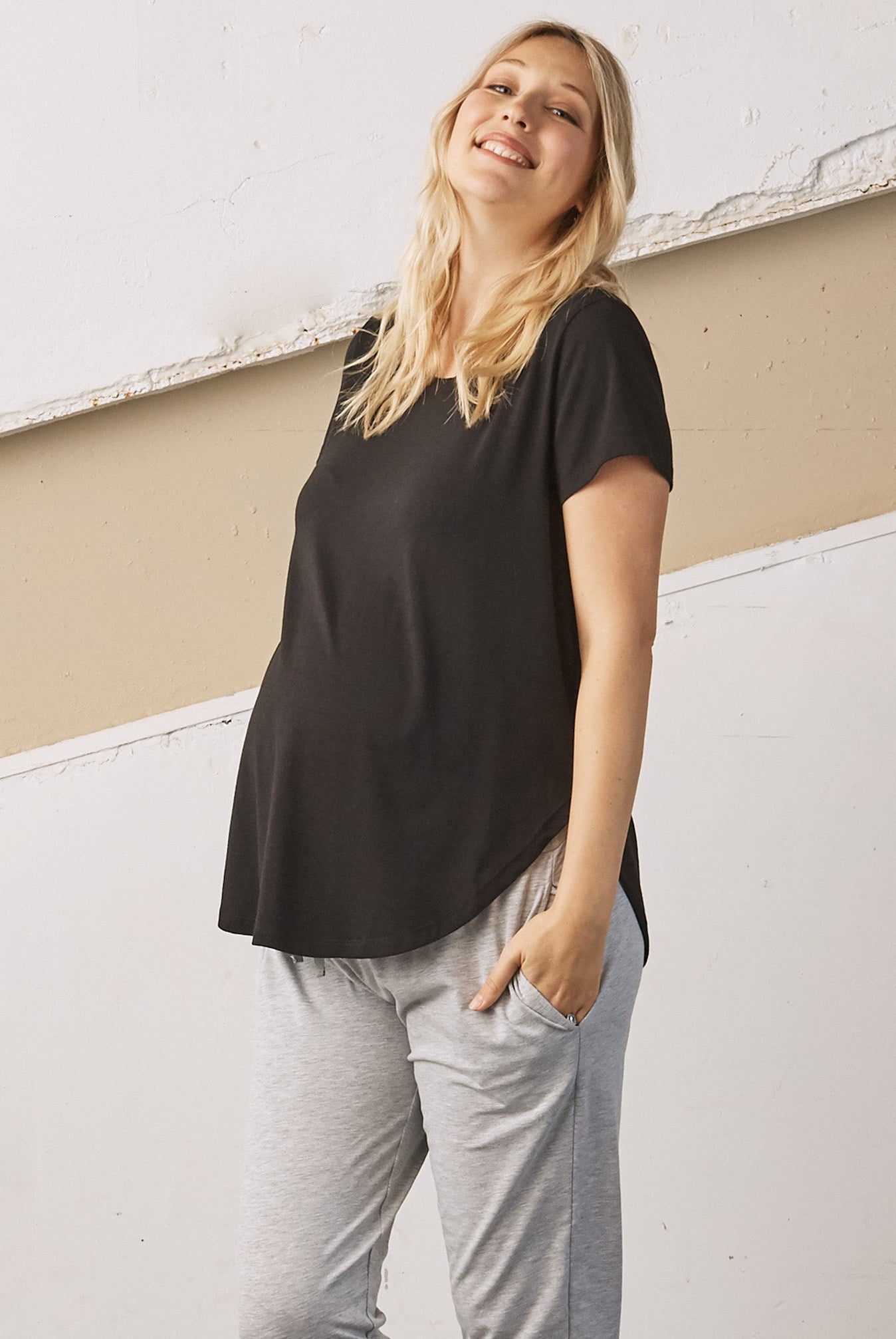 Main view - A Pregnant Woman in Black Basic Maternity Bamboo/Cotton T-shirt (6709414953063)