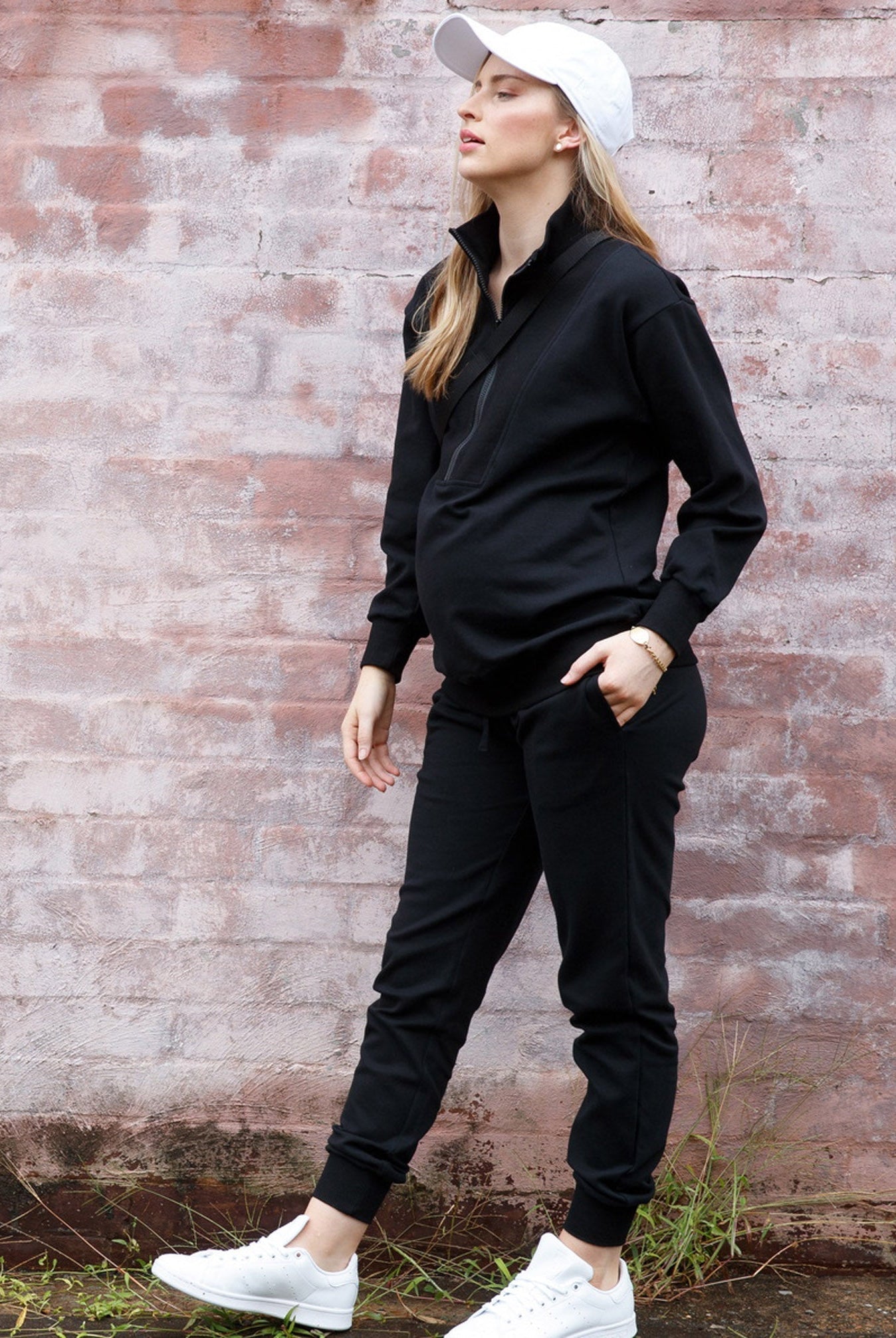 Main view - A pregnant woman in 2-Piece Calla zip front black Maternity Tracksuit Set (6718252810334)