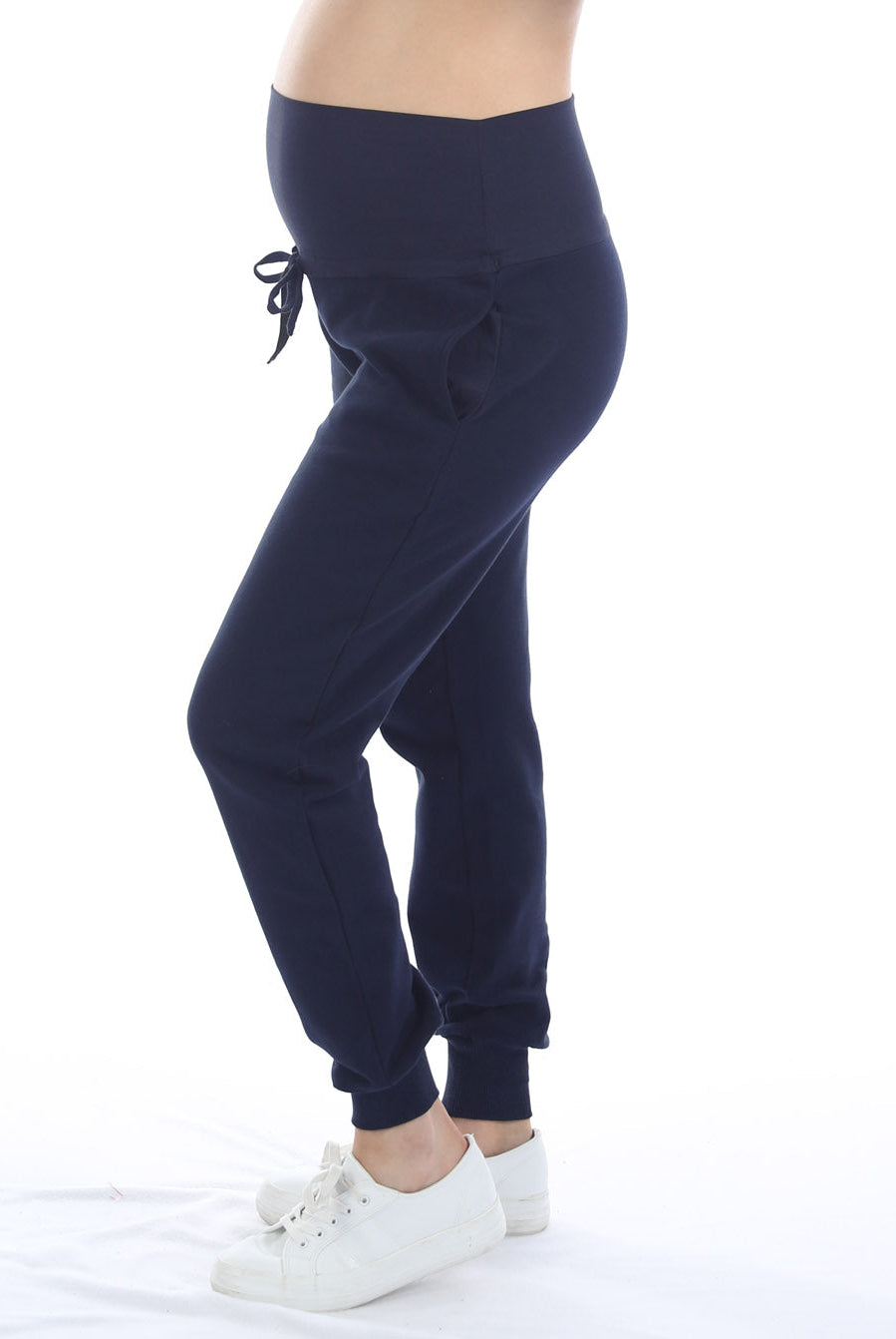Side view - A pregnant woman in 2-Piece Calla zip front black Maternity Track Pants (6718252810334)