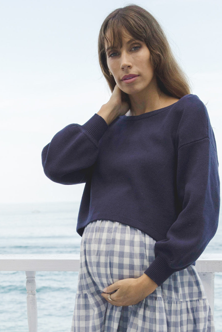 Front view - A Pregnant Woman in Long Sleeve Navy Cotton Maternity Top (6621360193630)
