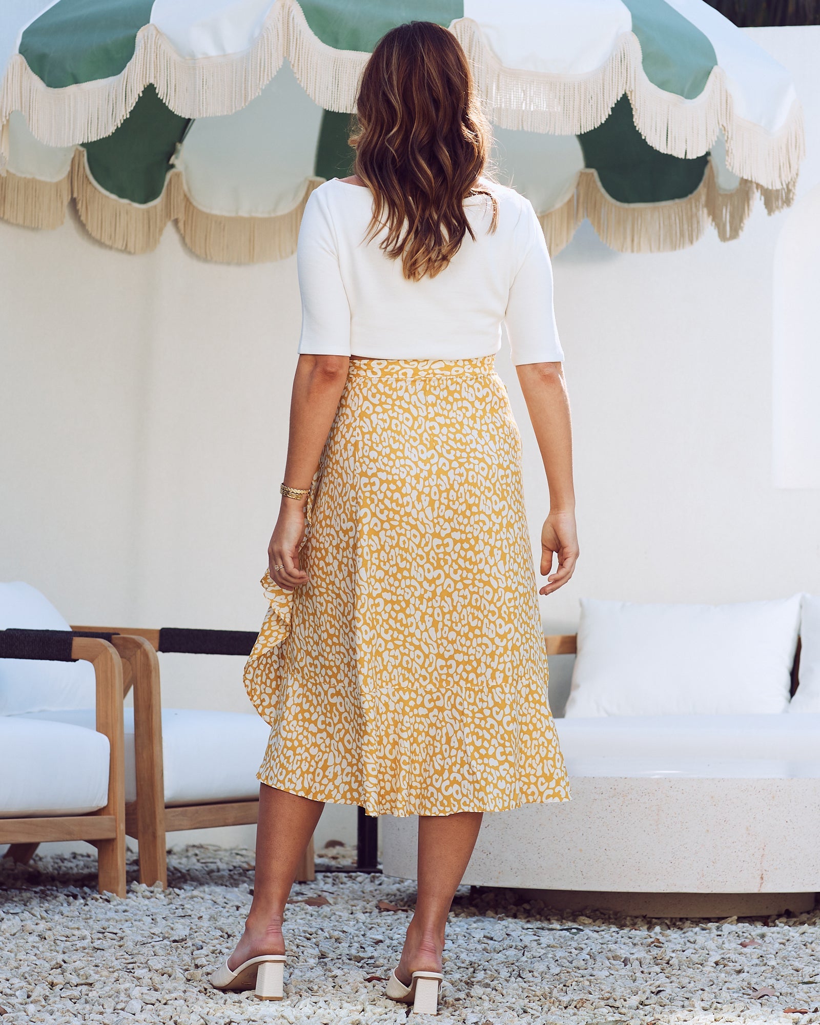 Back view - maternity wrap ruffled skirt in mustard leopard print