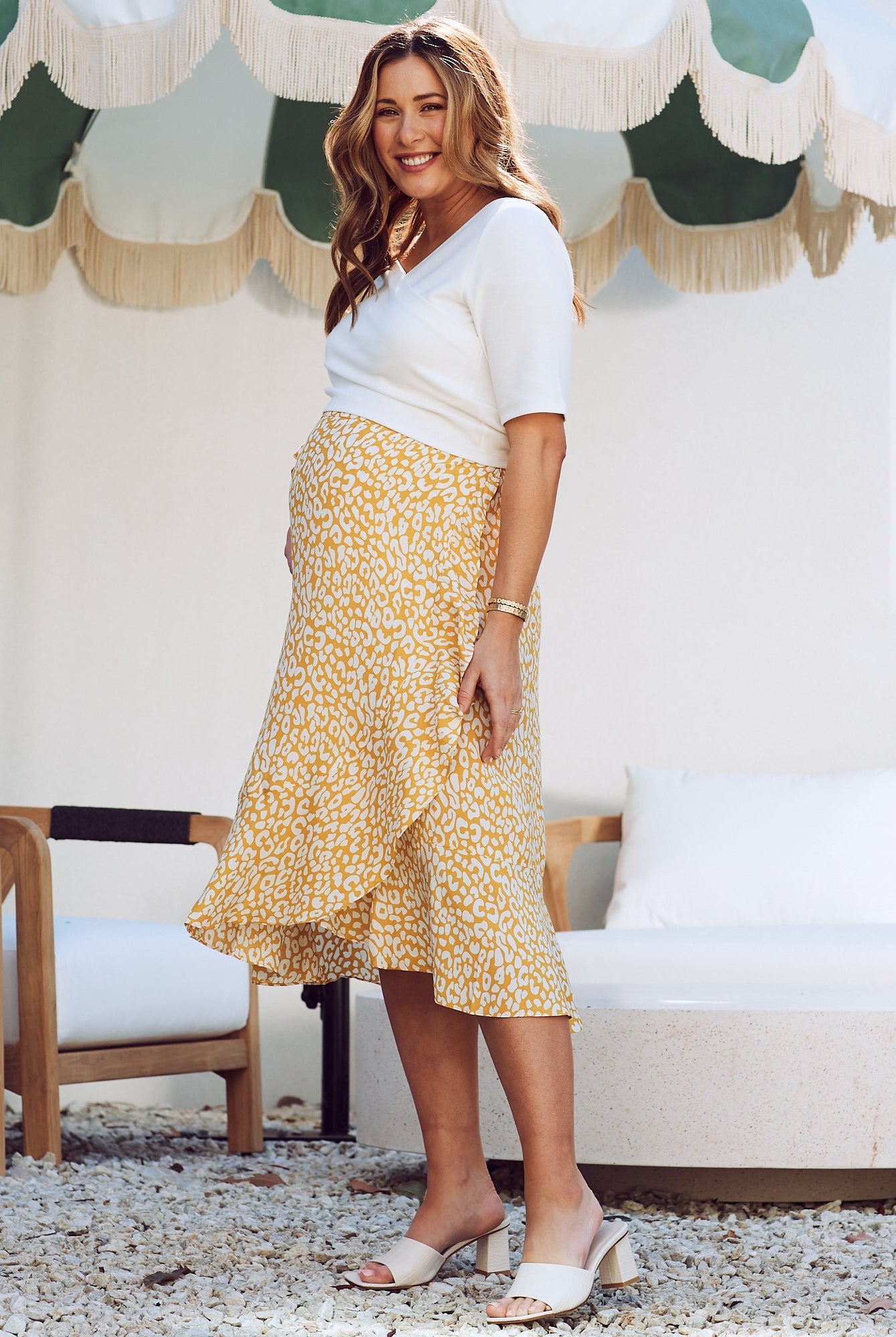 Side view - maternity wrap ruffled skirt in mustard leopard print
