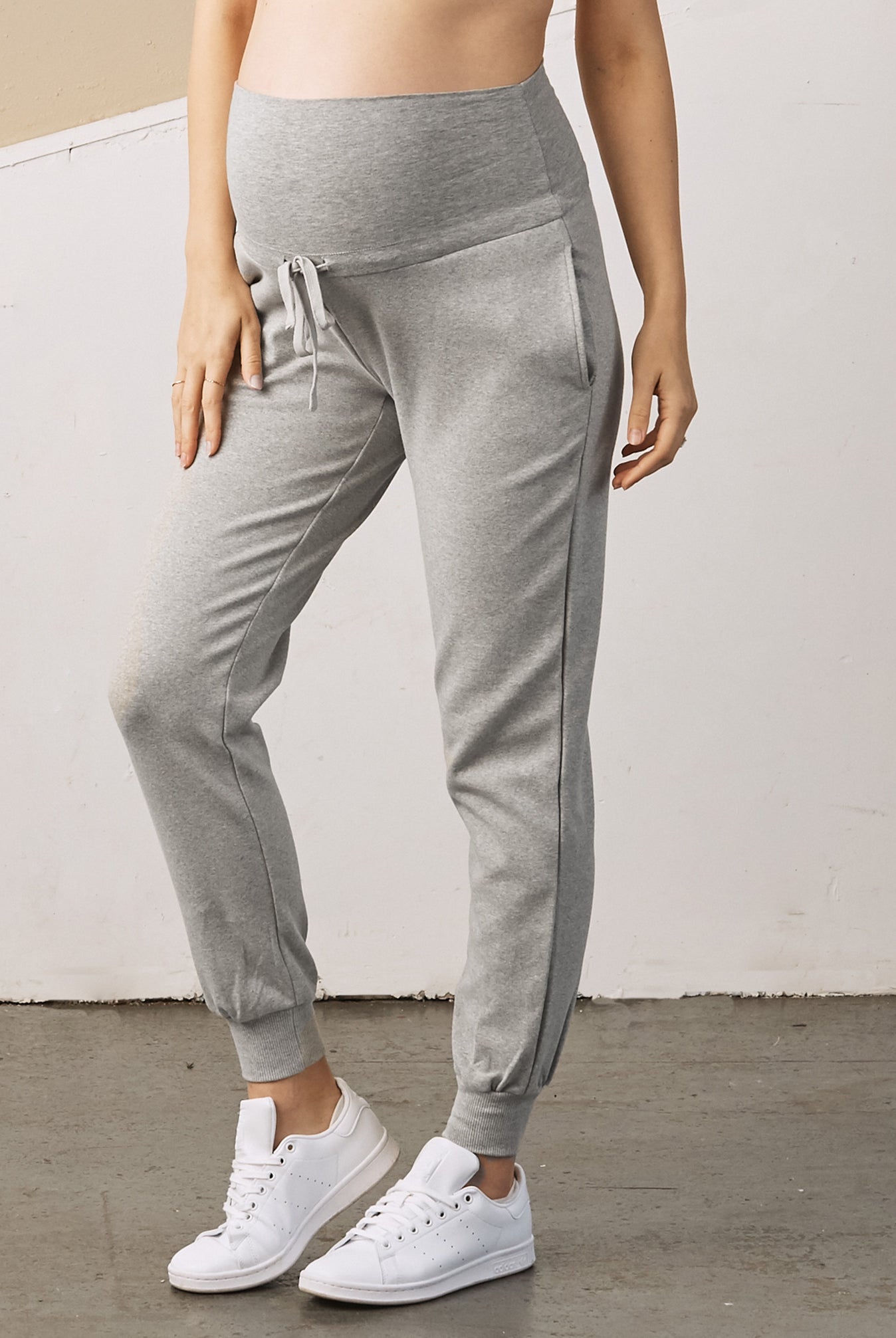 Main View - A Pregnant Woman in Essential Maternity Sweatpants in Grey Color from Angel Maternity (6728300920926)