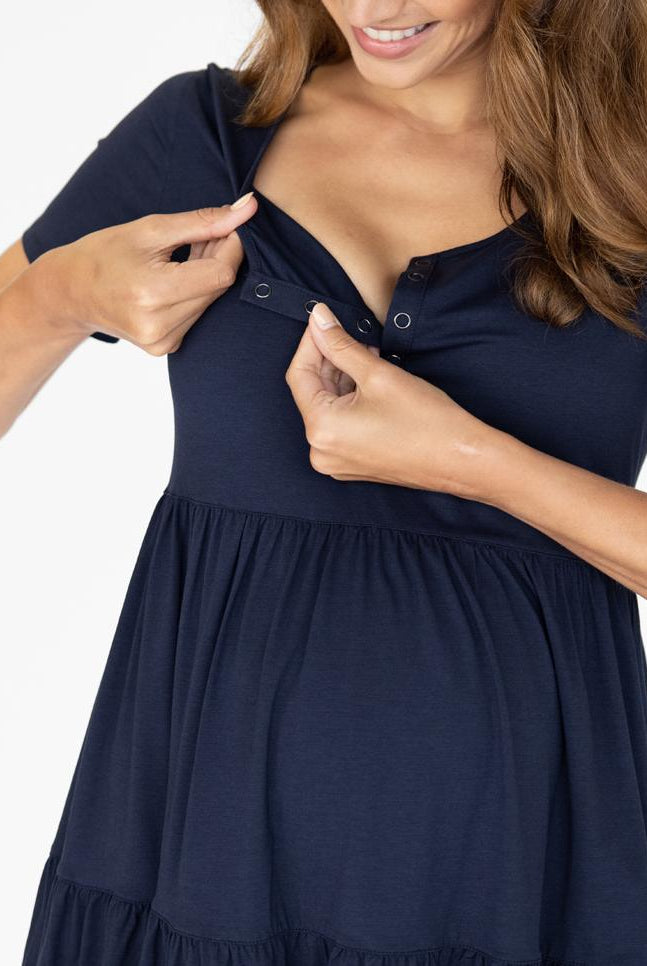 A woman in navy maternity tiered dress, nursing (4827569651806)