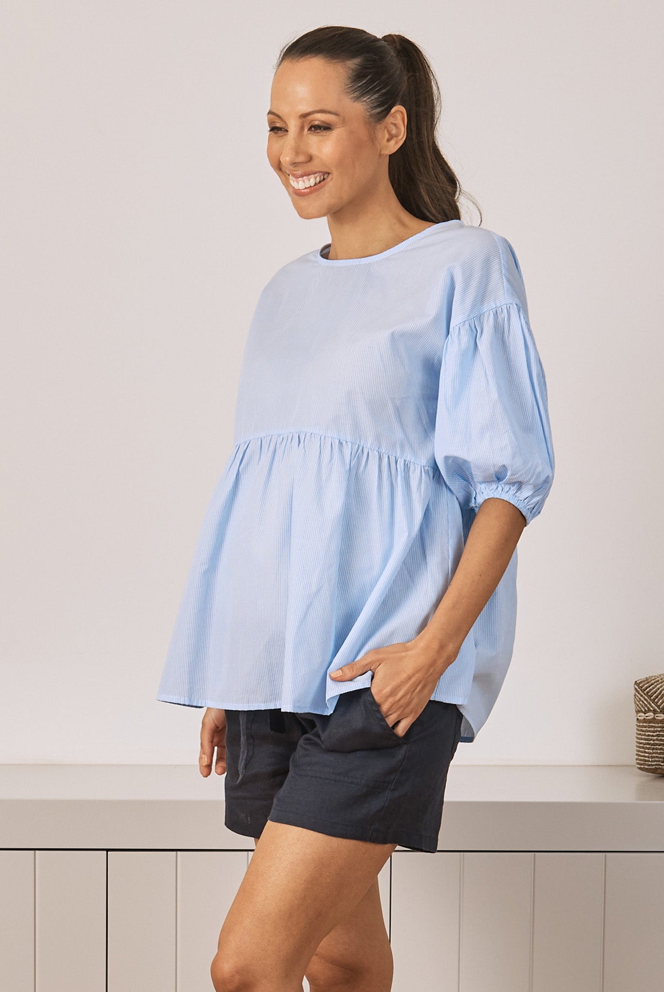 Main View - A Young Pregnant Woman in Maternity Cotton Blouse Top in Blue Stripe Colour