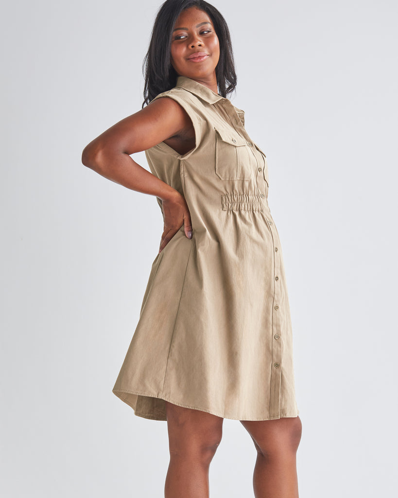 Side View - A Pregnannt Woman Wearing Kaya Maternity Safari Cotton Shirt Dress In Beige from Angel Maternity.