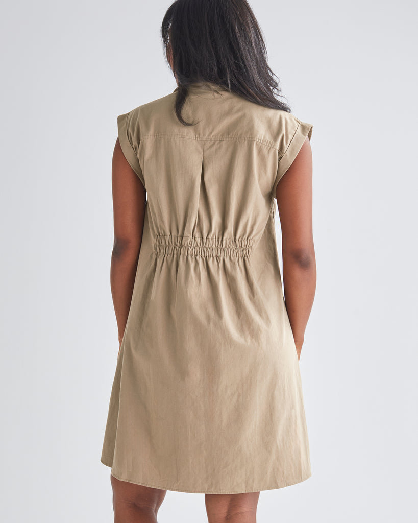 Back View - A Pregnannt Woman Wearing Kaya Maternity Safari Cotton Shirt Dress In Beige from Angel Maternity.