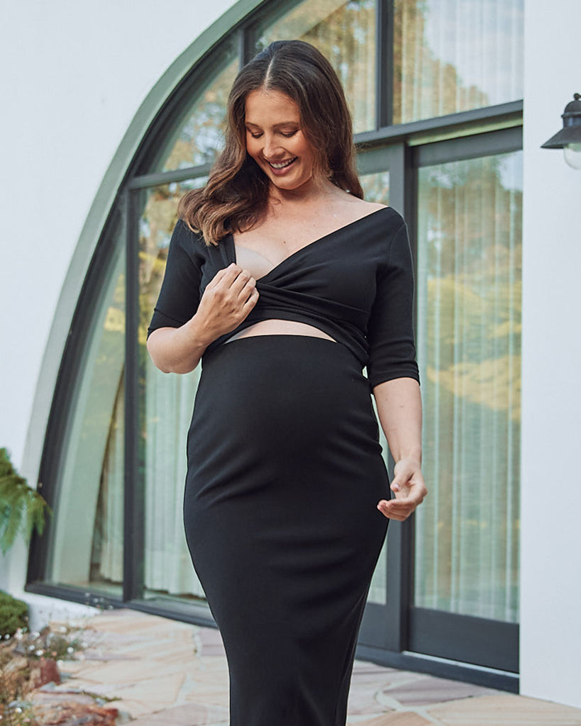 Black maternity top in top and skirt set showing easy breastfeeding access from Angel Maternity