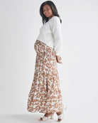 Side View: Long skirt Strapless dress Shirred elastic waist band. Colour: Brown Floral Print from Angel Maternity