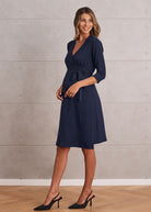 Side view - Maternity Classic Wrap Feeding Dress in Navy - Angel Maternity USA