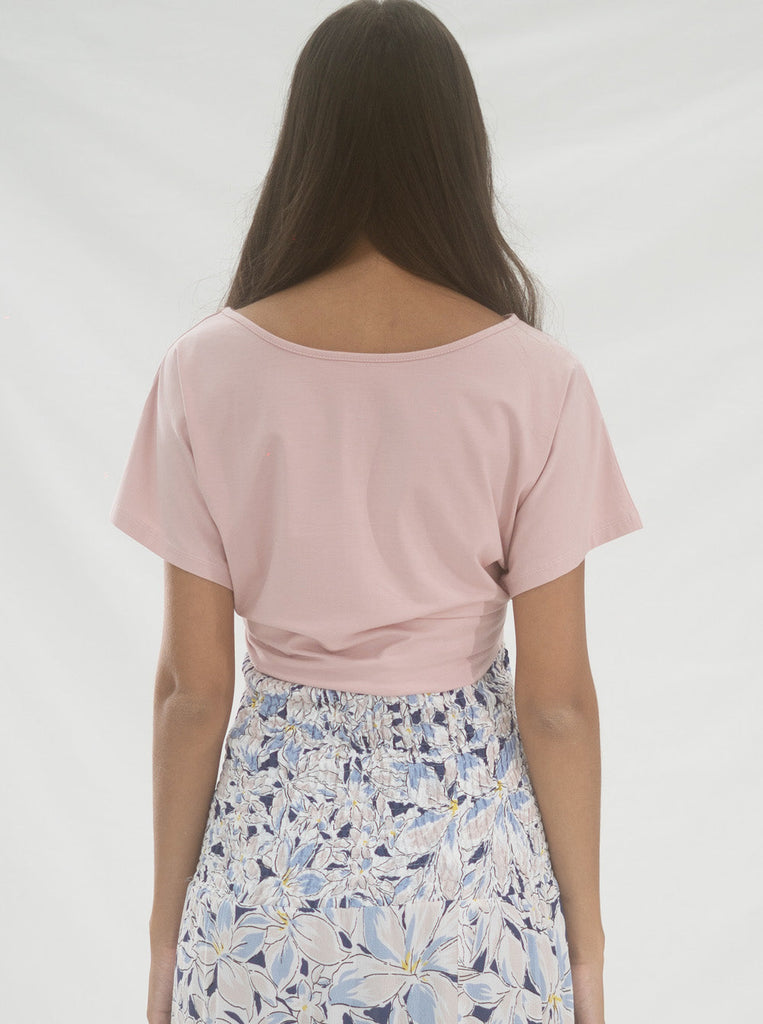 Back view -  A young pregnant woman in Reversible Pink Maternity Tee Top (6659033825374)