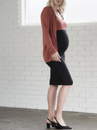Side view - 3-piece set: This set includes: a Ginger coloured versatile cardigan, a matching maternity singlet and midi length black maternity skirt, (6714932592734)