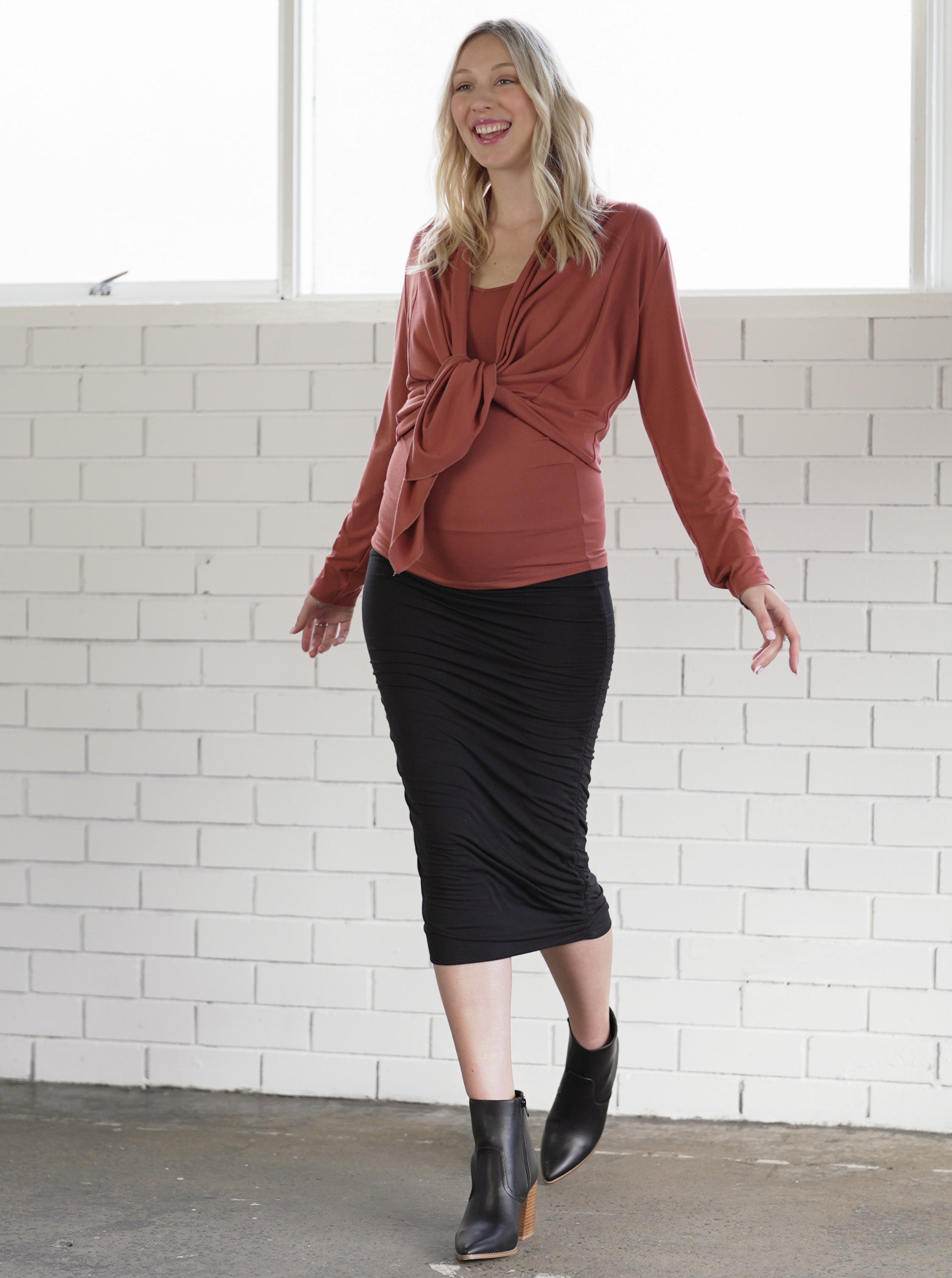 Front view - 3-piece set: This set includes: a Ginger coloured versatile cardigan, a matching maternity singlet and midi length black maternity skirt, (6714932592734)
