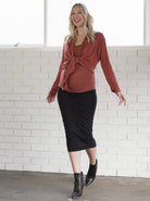 Front view - 3-piece set: This set includes: a Ginger coloured versatile cardigan, a matching maternity singlet and midi length black maternity skirt, (6714932592734)