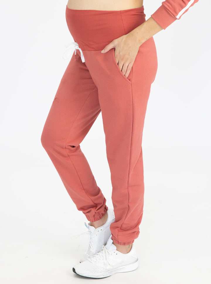 Side view - Maternity Track pants in Coral (4788131070046)
