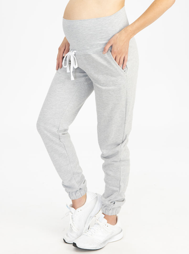 Main view - A Pregnant Woman in Maternity Sweatpants in Grey Color (6729381085278)