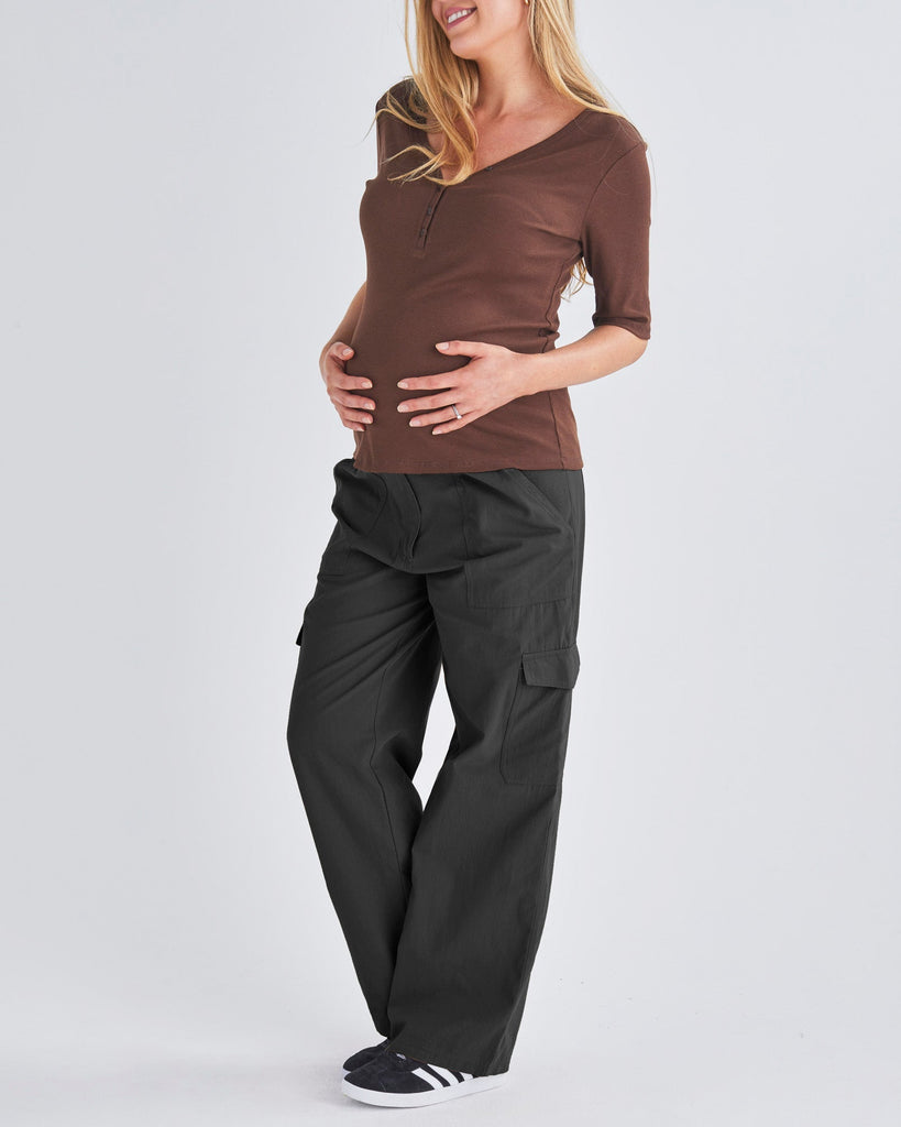 A Pregnant Woman Wearing Maternity Black 100% Cotton Cargo Pants from Angel Maternity  from Angel Maternity
