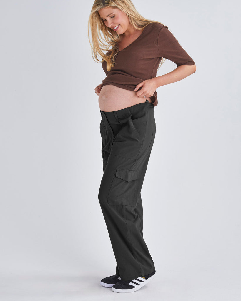 Full View - A Pregnant Woman Wearing Maternity Black 100% Cotton Cargo Pants from Angel Maternity  from Angel Maternity