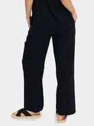 Back view -Black linen maternity pants; perfect for hot weather. (6640782049374)