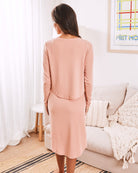 A women nursing aBack view -  maternity nursing friendly loungewear dress in pink 