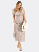 A woman in beige leopard print maternity nursing wrap dress, main (6659012821086)