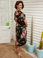 Back view - Bella Black Floral Print V-neck Maternity Dress . Button front for easy access for breastfeeding. (6677946925150)