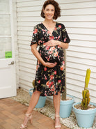 Main view - Bella Black Floral Print V-neck Maternity Dress . Button front for easy access for breastfeeding. (6677946925150)