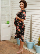 Side view - Bella Black Floral Print V-neck Maternity Dress . Button front for easy access for breastfeeding. (6677946925150)
