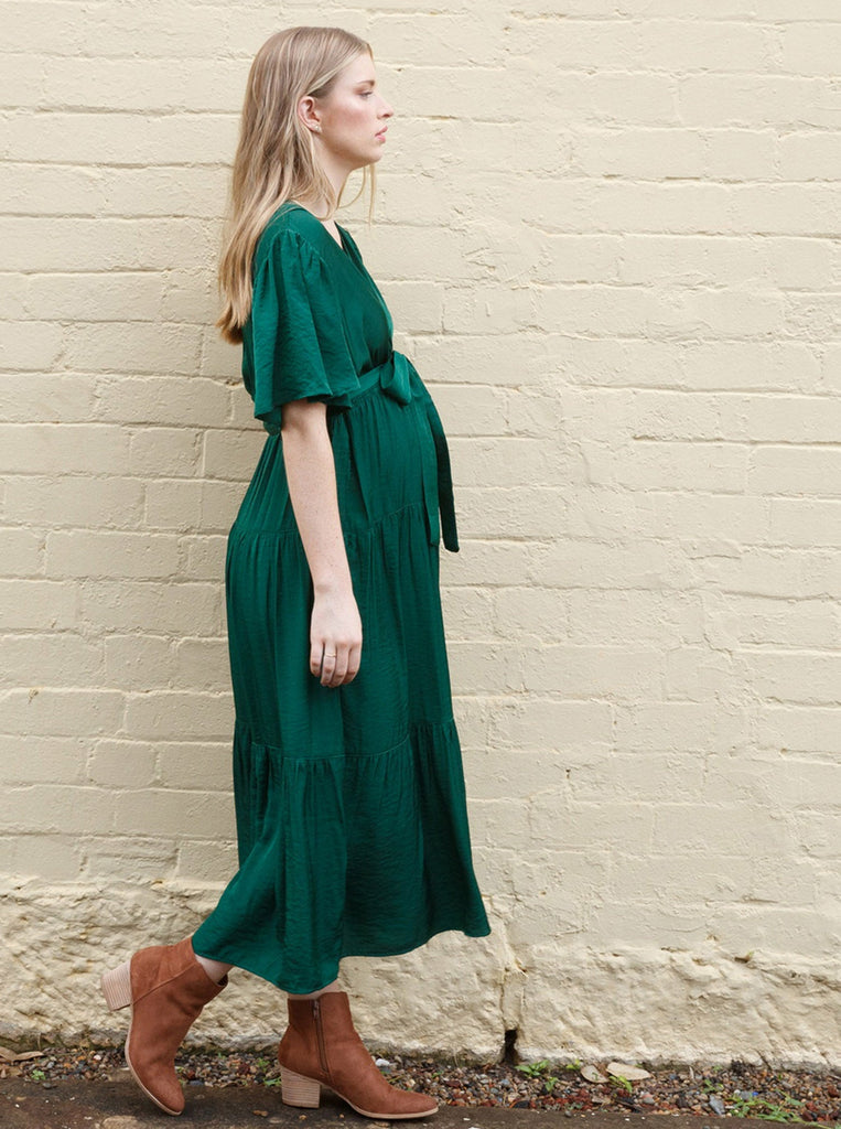 Side view - A woman in emerald green long maternity dress, (6672552722526)