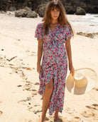 A woman in floral pink maternity & nursing wrap dress, front (6672544006238)