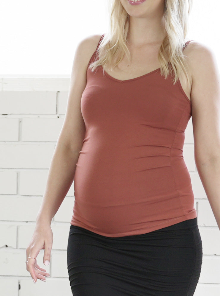 Front view - 3-piece set: This set includes: a Ginger coloured versatile cardigan, a matching maternity singlet and midi length black maternity skirt, (6714932592734)