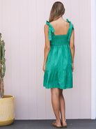 Back View - A pregnant Woman in Maternity Summer Shirred Green Linen Dress - Shoulder Tie
