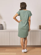 Bcak View - A Pregnant Woman in Maternity & Nursing Zipper Drawstring Dress in Laurel green Colour