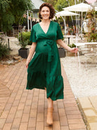 Main View - A pregnant Woman in Emerald Green Long Maternity Maxi Dress from Angel Maternity (6672552722526)