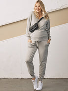 Main View - A Pregnant Woman in Calla Zip Front 2-piece Cotton Maternity Sweatsuit Set in Marl Grey Color from Angel Maternity (6726621003870)