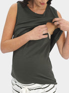 A woman in khaki maternity nursing tank, feeding (6639696314462)
