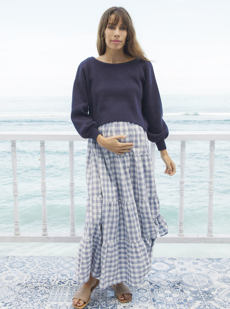 Full view - A Pregnant Woman in Long Sleeve Navy Cotton Maternity Top on seafront balcony (6621360193630)
