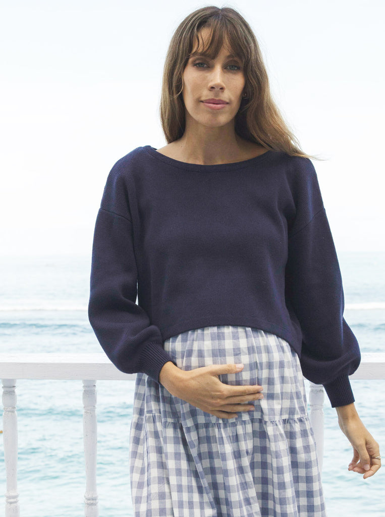 Main view - A Pregnant Woman in Long Sleeve Navy Cotton Maternity Top touching her bump (6621360193630)
